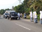 Peduli Kabut Asap, Sejumlah Siswa SMK N 1 Sutera Bagikan Masker Gratis di Pessel