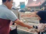 Pemerintah Kecamatan Pangkalan dan Harau Bersama TNI Bagikan 700 Masker
