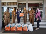 Pemko Payakumbuh Terima Bantuan 130 Paket Sembako dan 90 Paket Hazmat dan Face Shield