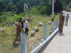 Bupati Hendrajoni, Instruksikan Kadis PU-PR, Pasang Kembali Pengaman Jalan (Guardrail) di Kawasan Mandeh