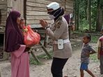 POLWAN DITLANTAS POLDA ACEH BAGI SEMBAKO UNTUK KAUM DHUAFA DI DARUL KAMAL ACEH BESAR