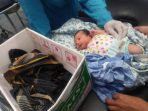 Geger, Bayi Dalam Kardus Ditemukan di Pinggir Jalan Pincuran Boga