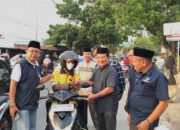 Syukuri Hasil Pileg, Partai NasDem Bagi Ratusan Takjil Untuk Driver Ojek Online Kota Padang