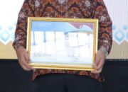 Bupati Asahan Terima Penghargaan Juara 1 Update Data Duta GenRe Tertinggi