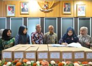 Pemprov Sumbar Perkuat Tata Kelola, Biro Adpim Serahkan 55 Box Arsip ke Biro Umum
