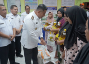 Pemkab Asahan Bersama Bulog Salurkan Bantuan Pangan CPP Periode Oktober – November 2025