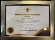 Pemkab Asahan Terima Penghargaan UHC 2026 Kategori Madya