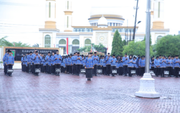 Rianto memimpin Upacara HKN Asahan di halaman kantor bupati