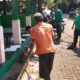 Karya Bakti TNI Bersihkan Mushola Desa